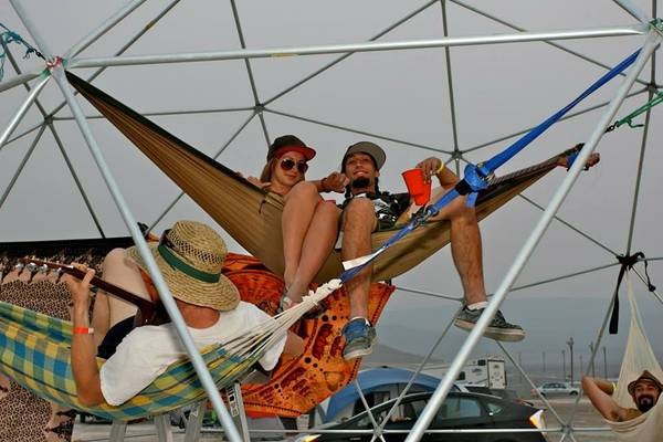 chillin high in a hammock in a sturdy geodesic dome frame